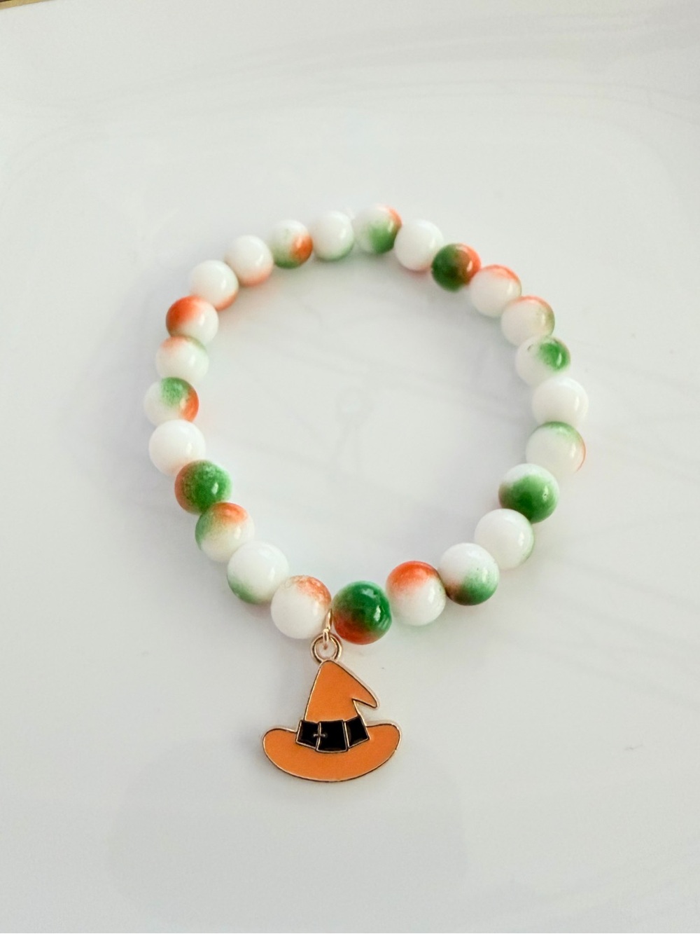 Handmade White, Orange & Green Beaded Bracelet with Witch Hat Charm
